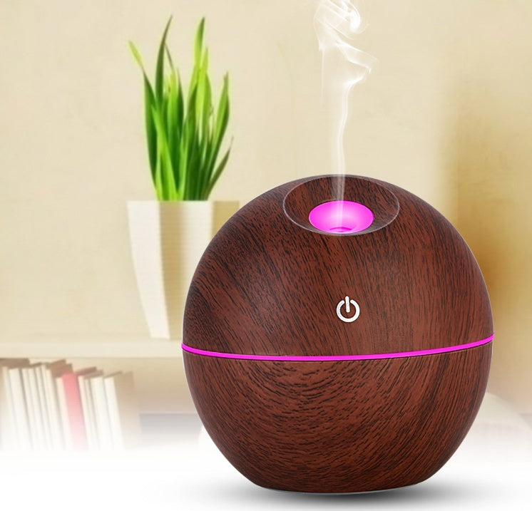 diffuseur-ultrasonique-Gros plan sur un diffuseur ultrasonique d'huiles essentielles-montrant son design élégant-diffuseur-ultrasonique-Diffuseur ultrasonique d'huiles essentielles dans un salon-créant une ambiance relaxante-See-I-J-L-univers-feminin-Transform your space into a haven of peace with our ultrasonic essential oil diffuser-Enjoy a soothing and fragrant atmosphere thanks to the ultrasonic essential oil diffuser